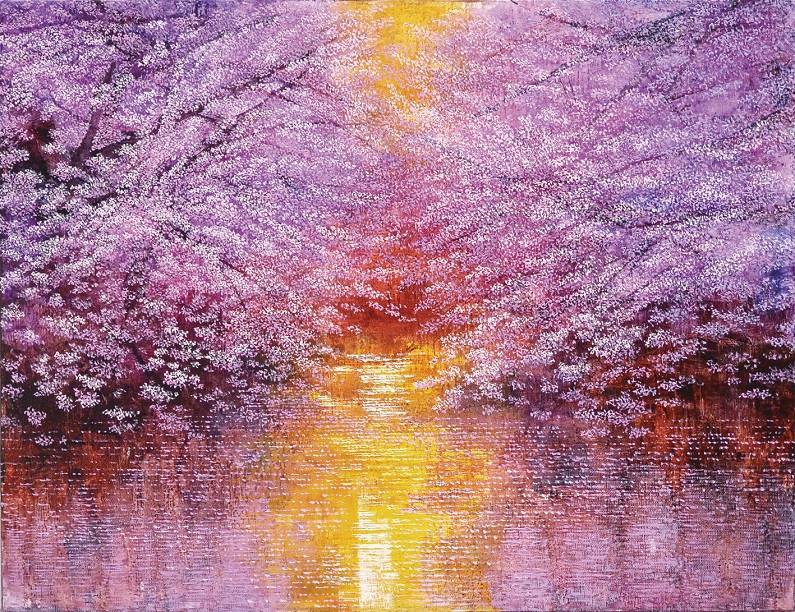 堀を覆う桜と黄金の夕日